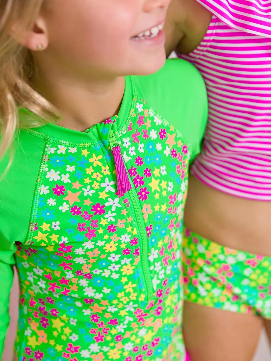 RuffleButts Girls One Piece Rash Guard Baby Swimsuit UPF 50  Sun Protection