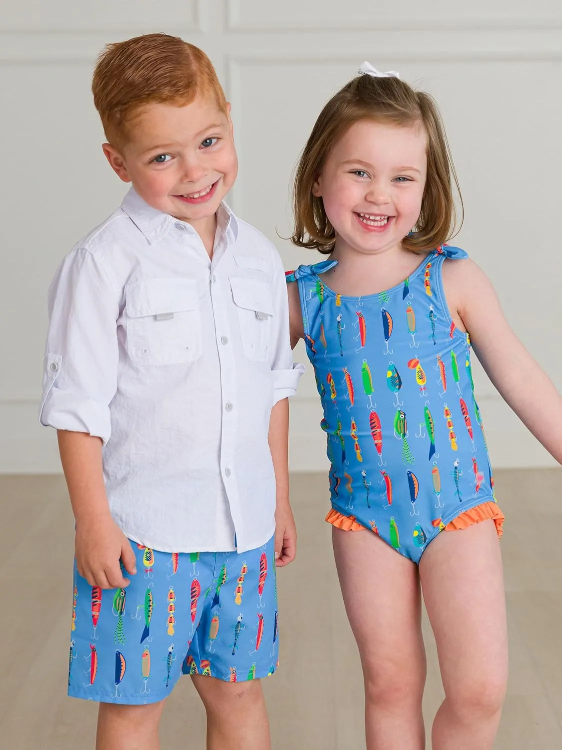 RuffleButts Girls UPF50  Sun Protection Tie Shoulder/Cross Back One Piece Swimsuit